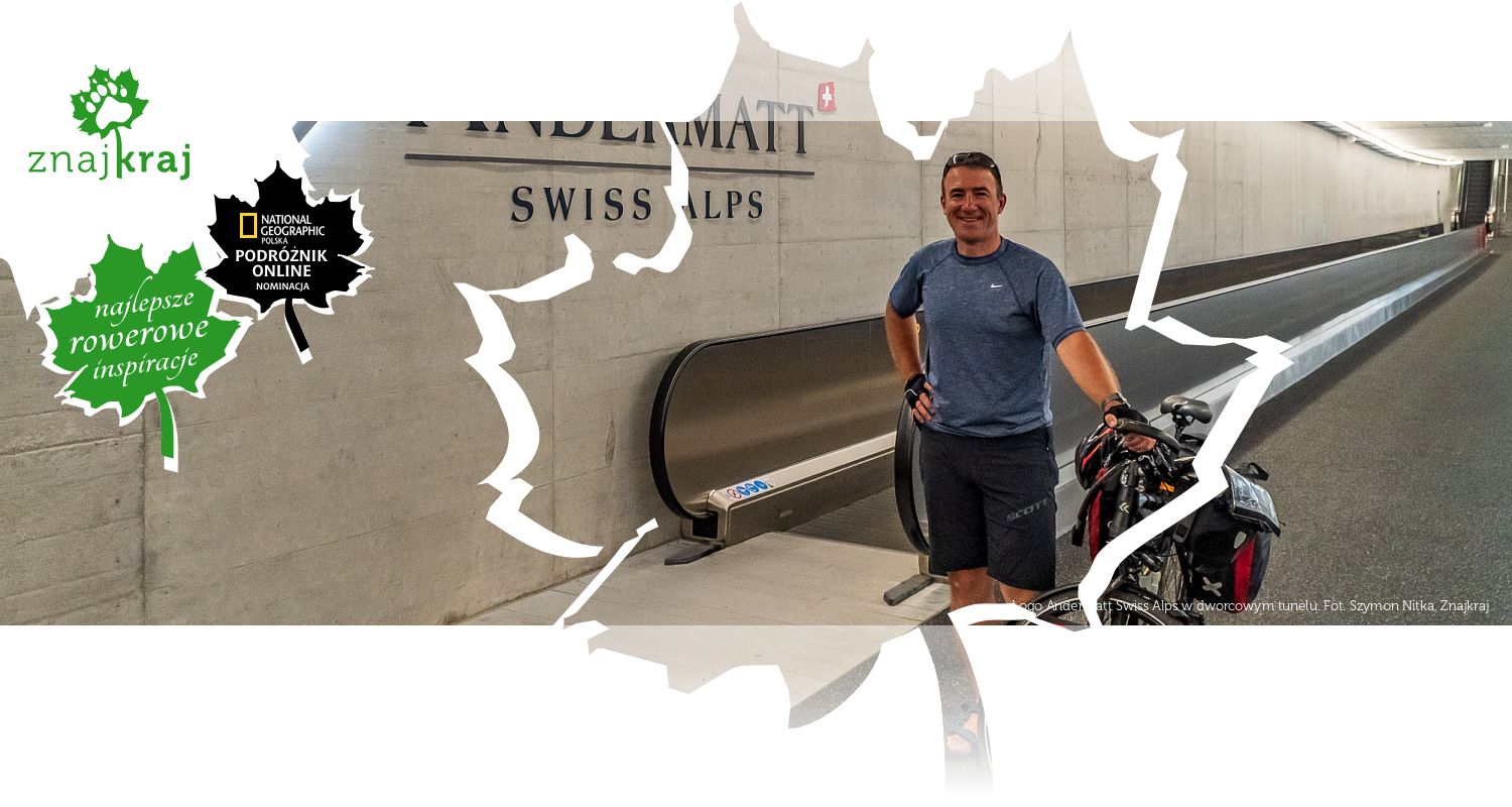Logo Andermatt Swiss Alps w dworcowym tunelu