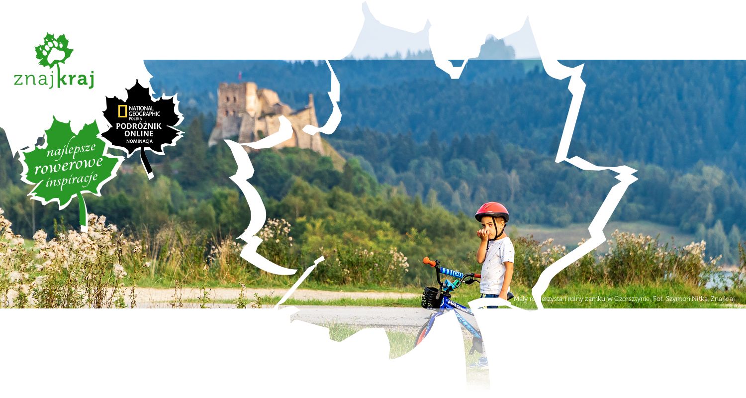 Mały rowerzysta i ruiny zamku w Czorsztynie
