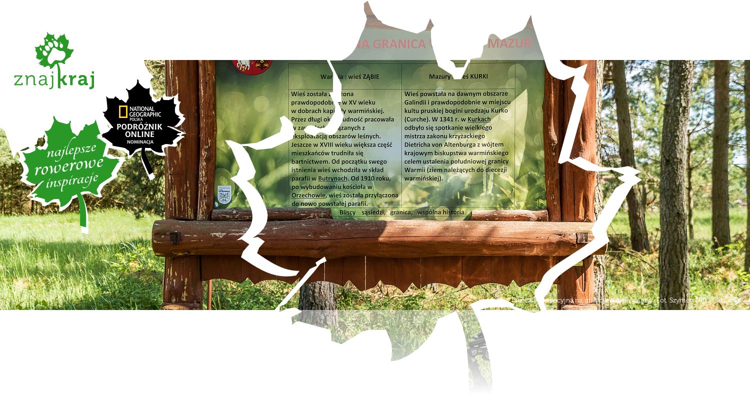 Tablica informacyjna na granicy Warmii i Mazur