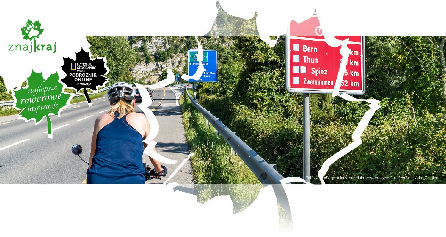 Tablica z odległościami na szlaku rowerowym